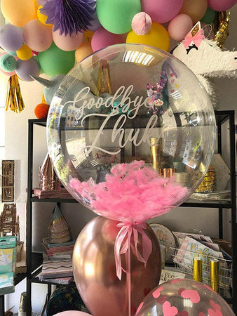Balon spersonalizowany 24" z napisem w piórkach napełniony helem